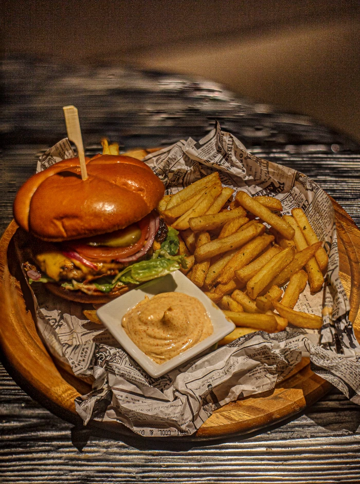 Burger with hunter's meat and fries