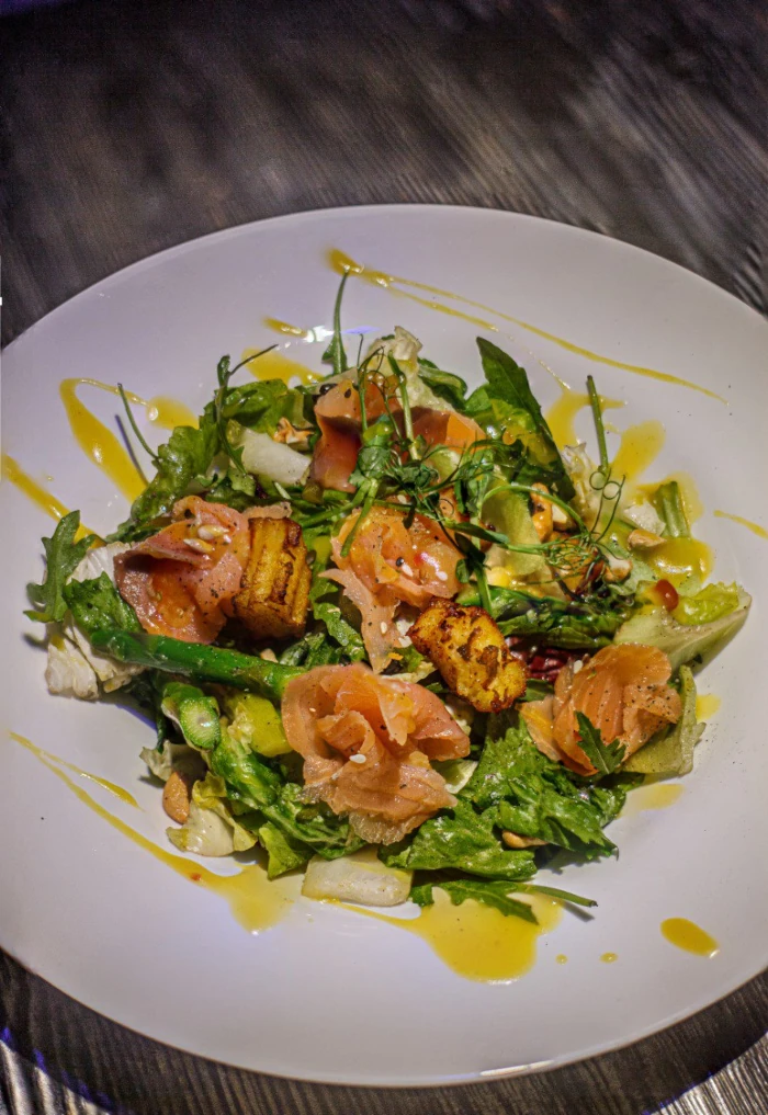 With lightly salted salmon and fried potatoes in mango sauce